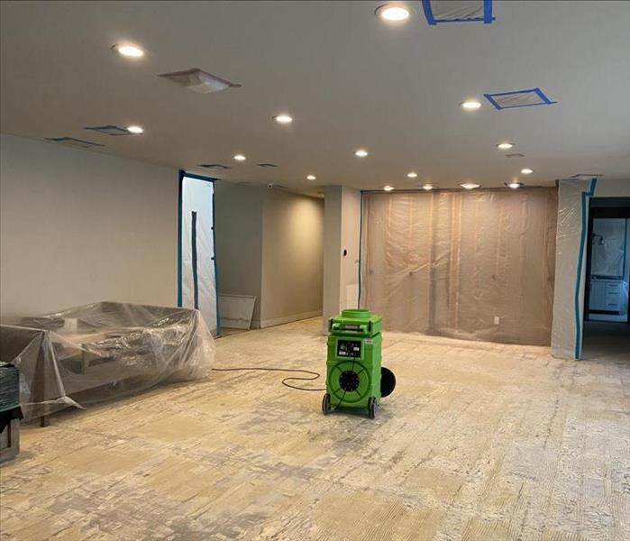 Mold removal in a home in Verde Valley, Arizona. The flooring and some drywall was removed and everything was tarped off.